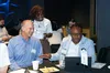 Cross-sector attendees actively engaging during a breakout discussion on vibe coding.