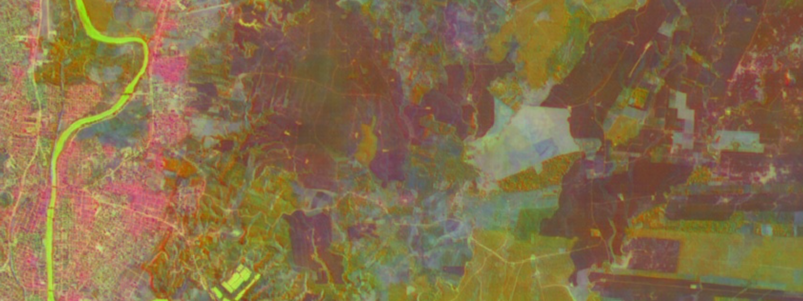 A multi-colored, highly detailed geospatial embedding visualization displaying a satellite view of land, forest tracts, and a winding river.